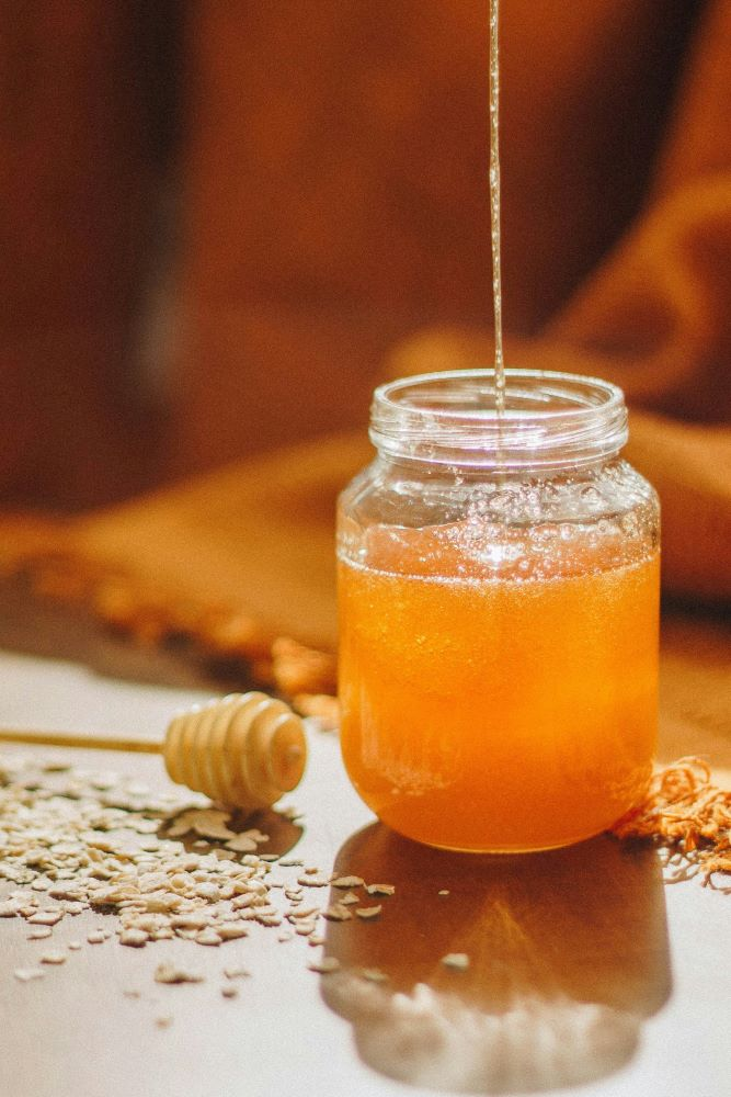 golden honey dripping, illustrating biblical symbolism and modern wellness