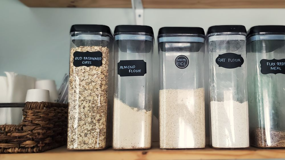 glass containers in pantry concious holistic living